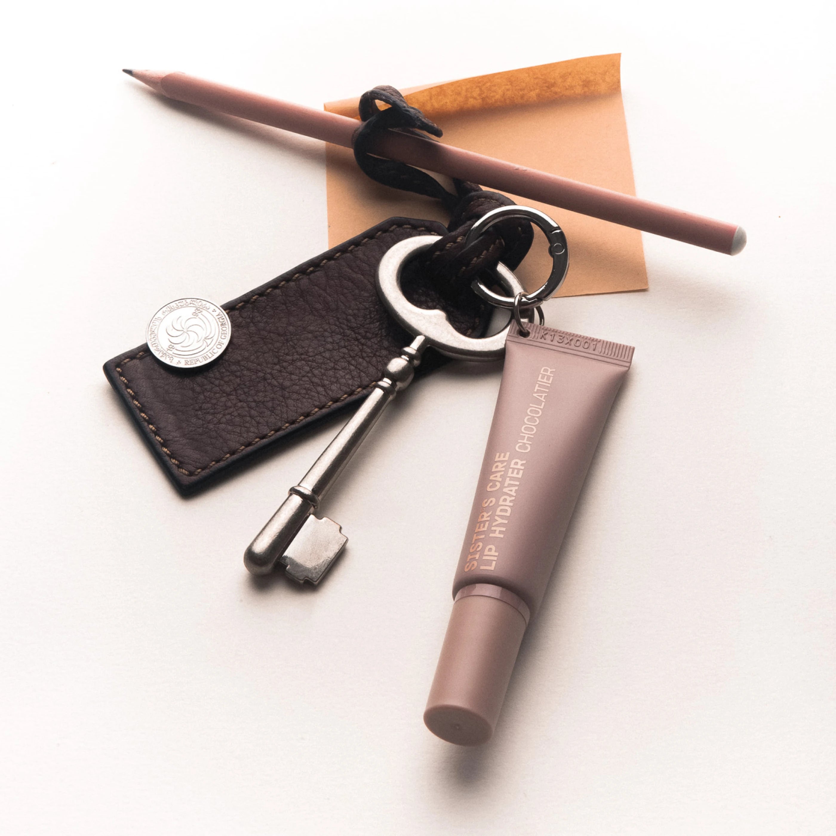 Sister's Aroma Chocolatier Lip Hydrator glitter key chain 10 ml